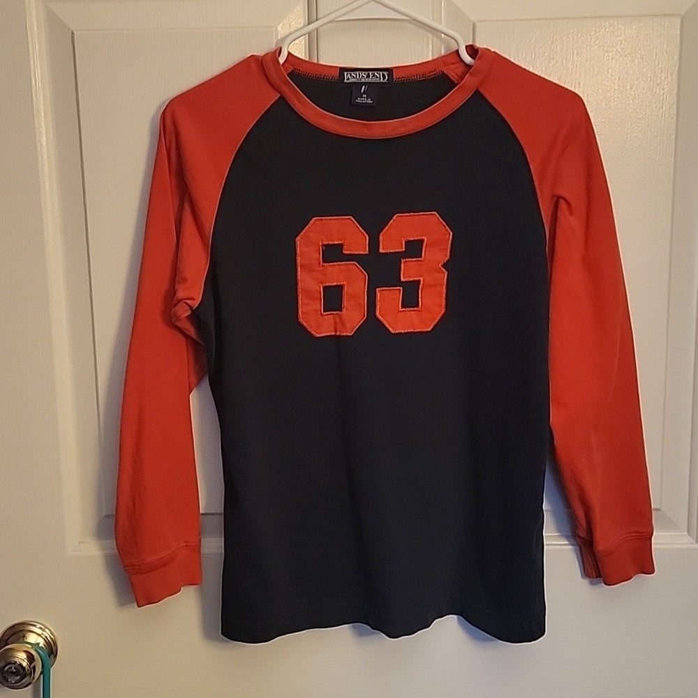 Lands End, boys, long sleeved jersey. Medium, orange and navy.